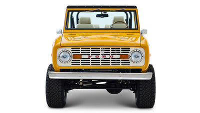 Ford Bronco 1975 in Chrome Yellow with custom Basket Weave Interior and Wimbledon White Wheels