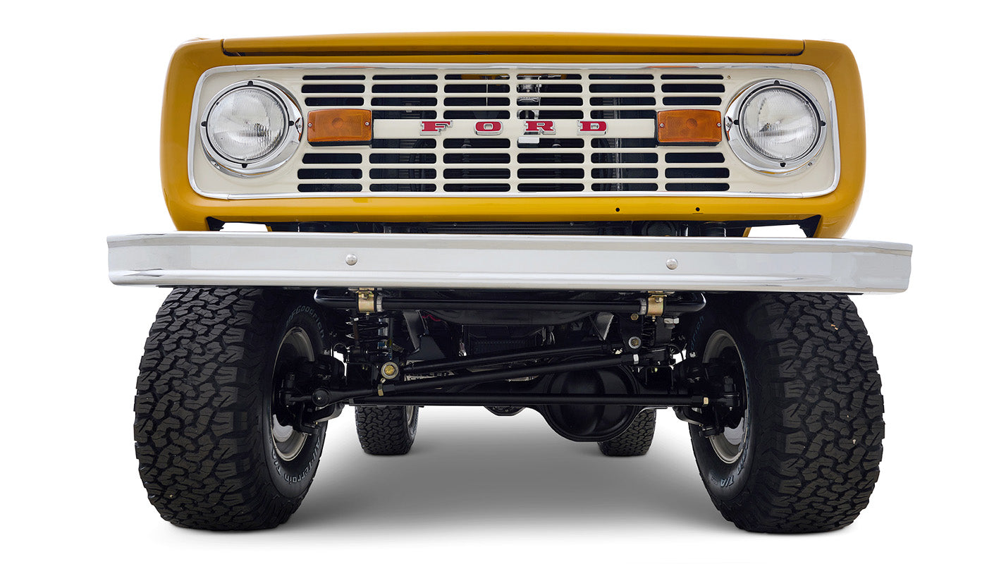 Ford Bronco 1975 in Chrome Yellow with custom Basket Weave Interior and Wimbledon White Wheels