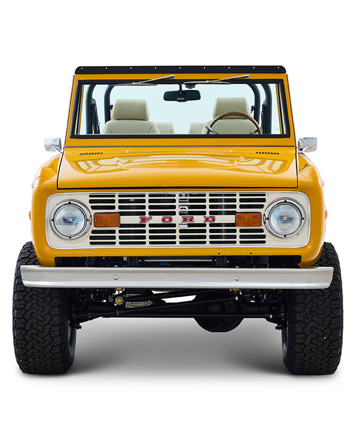 Ford Bronco 1975 in Chrome Yellow with custom Basket Weave Interior and Wimbledon White Wheels