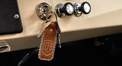 Classic Ford Bronco ignition switch with key and brown leather keychain