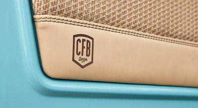 Leather or vinyl material panel with stitched logo reading 'CFB Series' on a light blue background