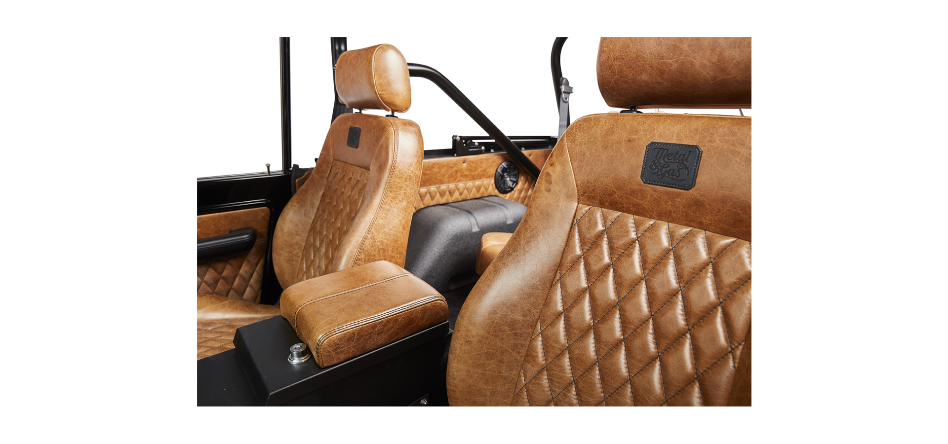 Tan leather upholstery with diamond stitch pattern on Classic Ford Bronco seats and door panels