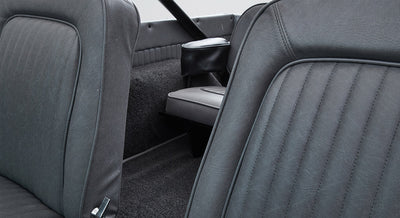 Close-up of gray upholstery seats and rear interior of Classic Ford Bronco