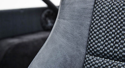 Detailed view of gray and black textured material on Classic Ford Bronco seat