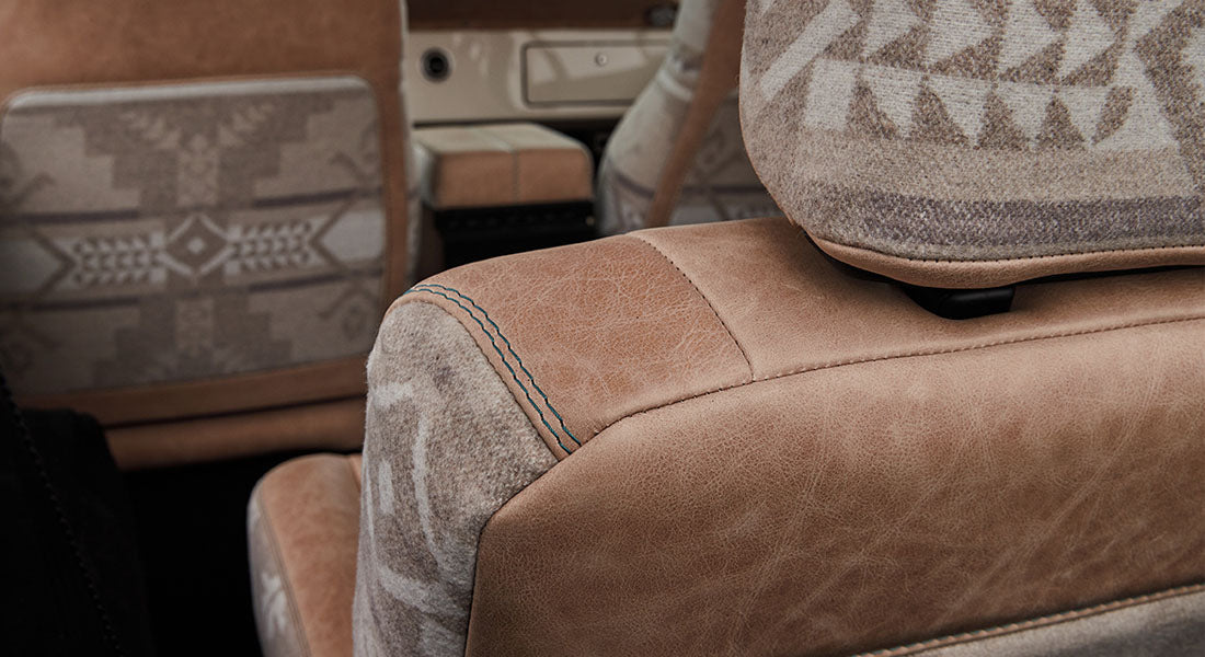 Close-up of Classic Ford Bronco seat fabric and leather upholstery details