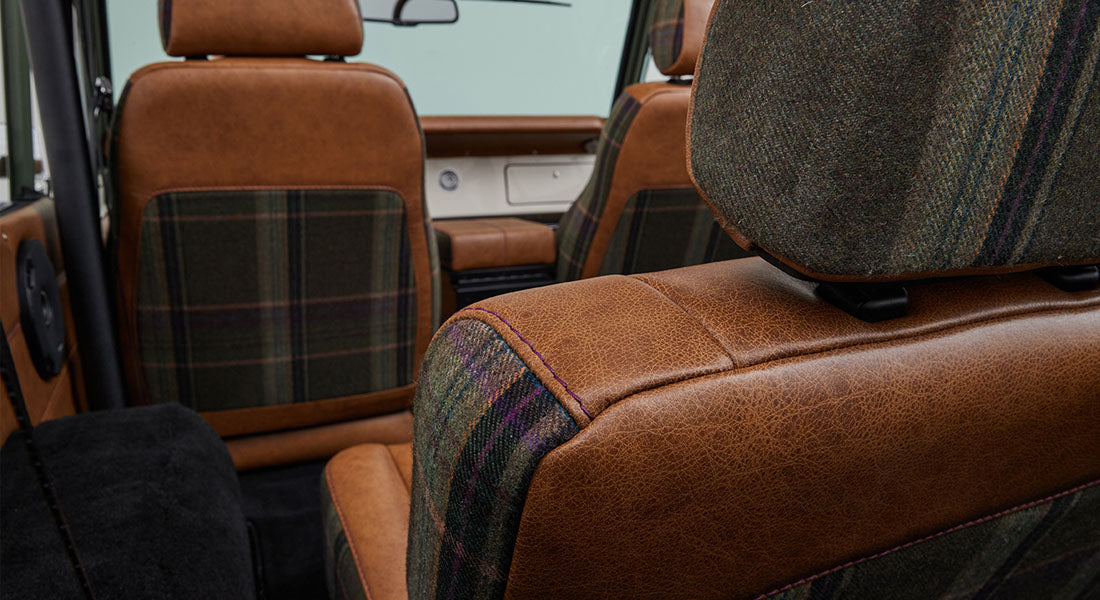 Classic Ford Bronco interior brown leather and plaid fabric rear seats with headrest