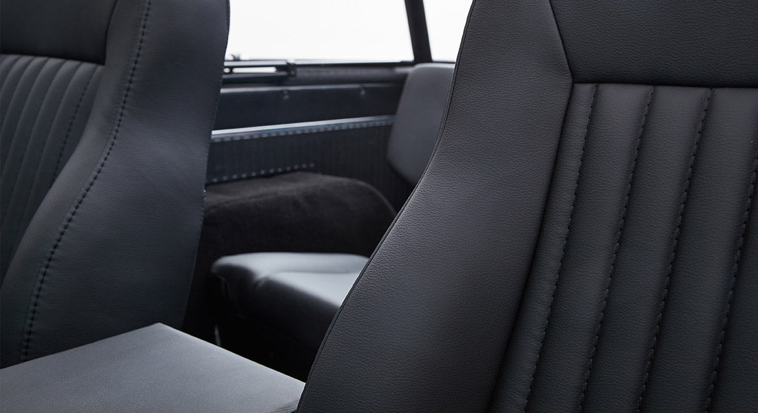Interior view of black leather seats in Classic Ford Bronco