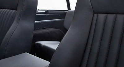 Interior view of black leather seats in Classic Ford Bronco