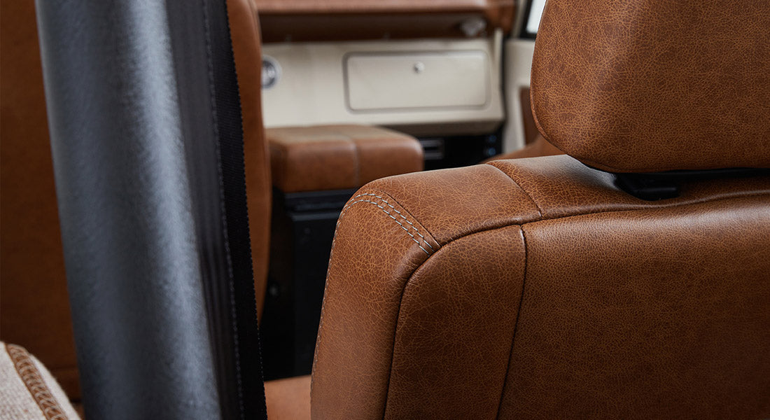 Close-up of brown leather seat upholstery inside Classic Ford Bronco
