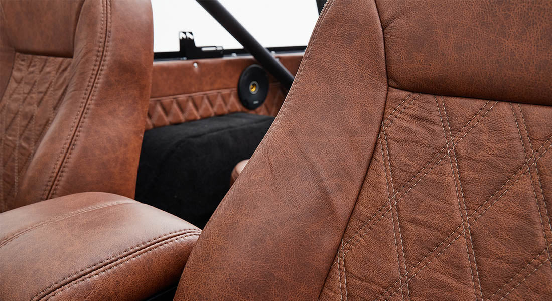 Brown leather seats with diamond stitch detail inside Classic Ford Bronco
