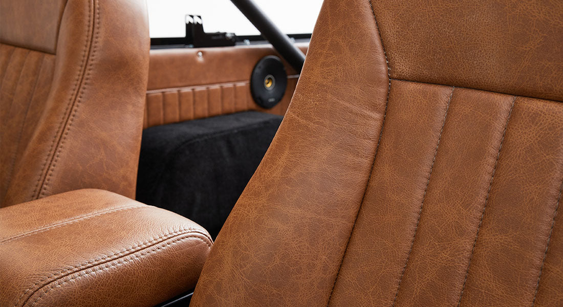 Brown leather seat close-up inside a Classic Ford Bronco