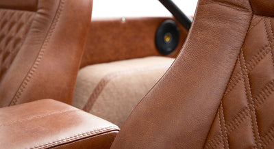 Close-up of tan leather Bryce Canyon seats and interior upholstery with stitching detail