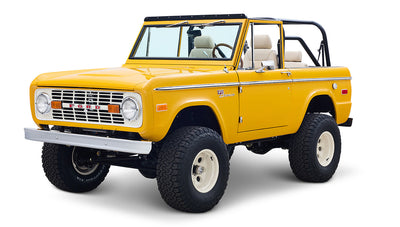 Ford Bronco 1975 in Chrome Yellow with custom Basket Weave Interior and Wimbledon White Wheels