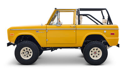 Ford Bronco 1975 in Chrome Yellow with custom Basket Weave Interior and Wimbledon White Wheels