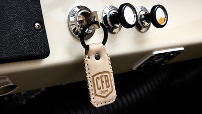 Ford Bronco 1975 in Chrome Yellow with custom Basket Weave Interior and Wimbledon White Wheels
