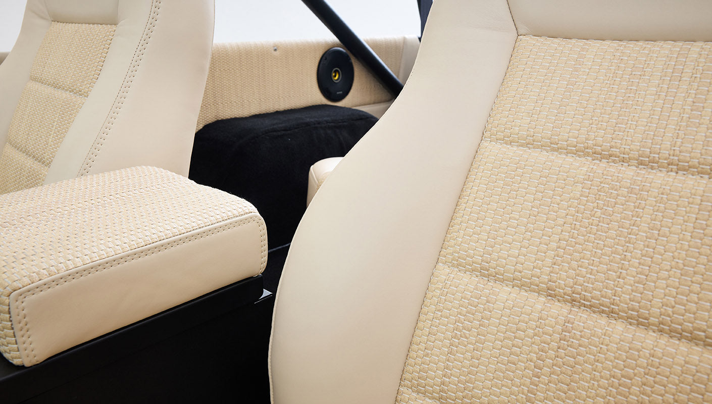 Ford Bronco 1975 in Chrome Yellow with custom Basket Weave Interior and Wimbledon White Wheels
