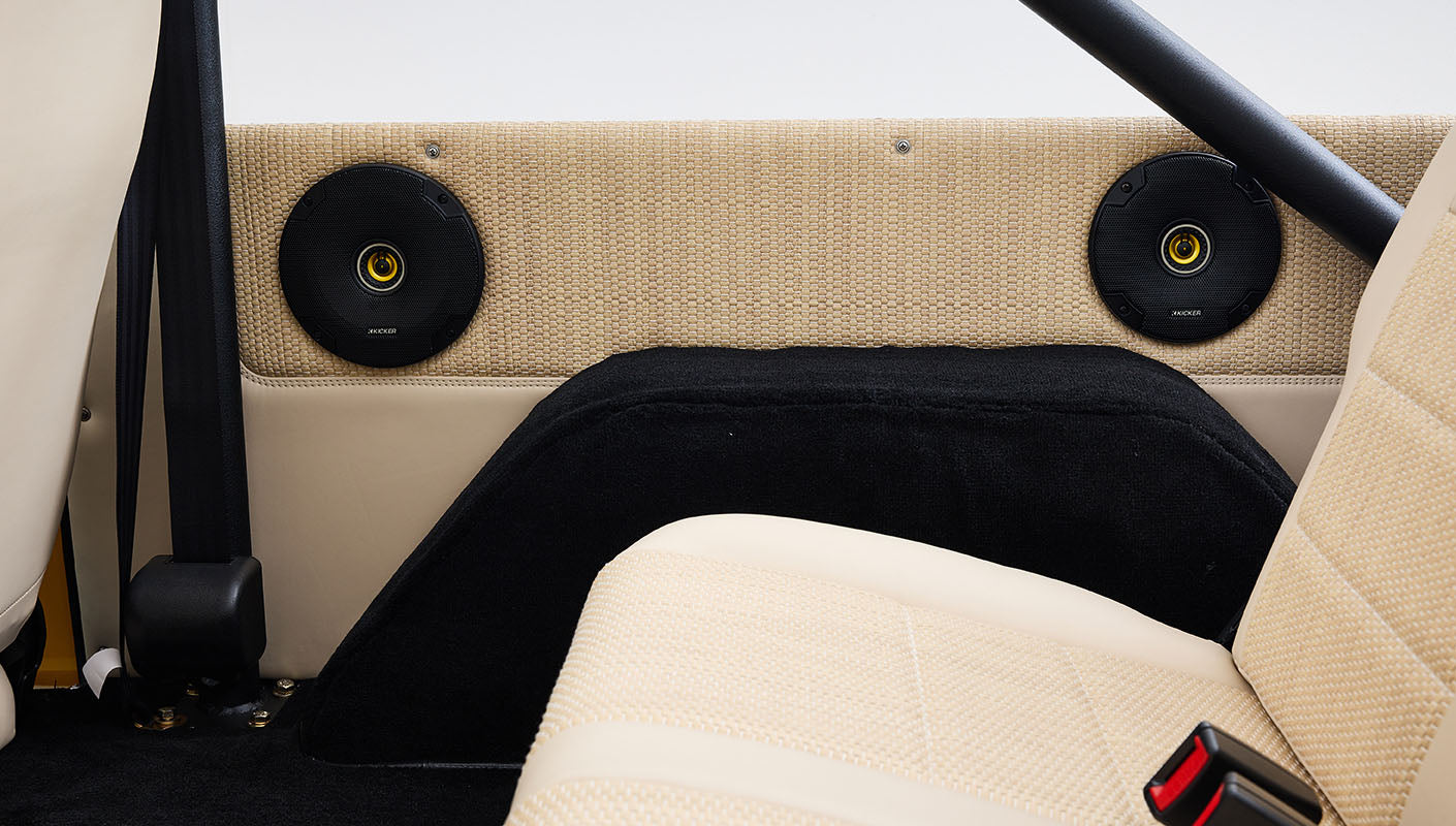 Ford Bronco 1975 in Chrome Yellow with custom Basket Weave Interior and Wimbledon White Wheels