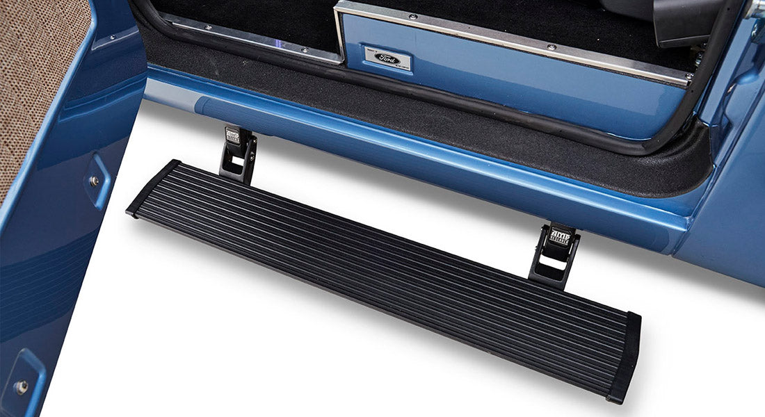 Black power step attached to a Classic Ford Bronco door frame