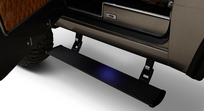 Classic Ford Bronco powerstep running board and tire portion under vehicle door