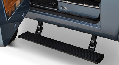 Black side step attached below the door of a Classic Ford Bronco