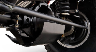 Black skid plate protecting metal undercarriage parts and suspension components near tire