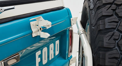 Rear panel of a Classic Ford Bronco showing spare tire carrier and tail light