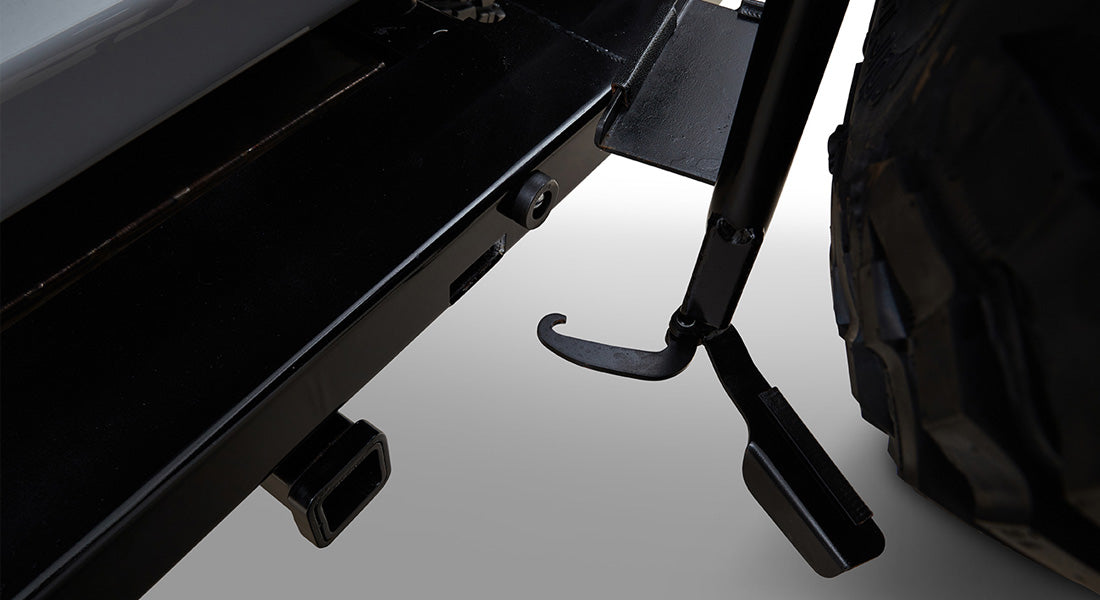 Metal frame and tire carrier hook under the rear of a Classic Ford Bronco near the bumper