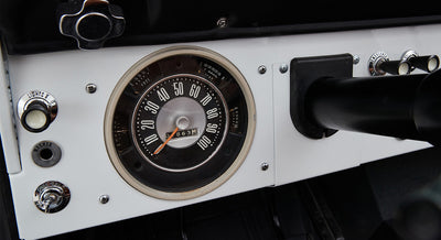 Classic Ford Bronco white speedometer displaying speed and fuel gauges