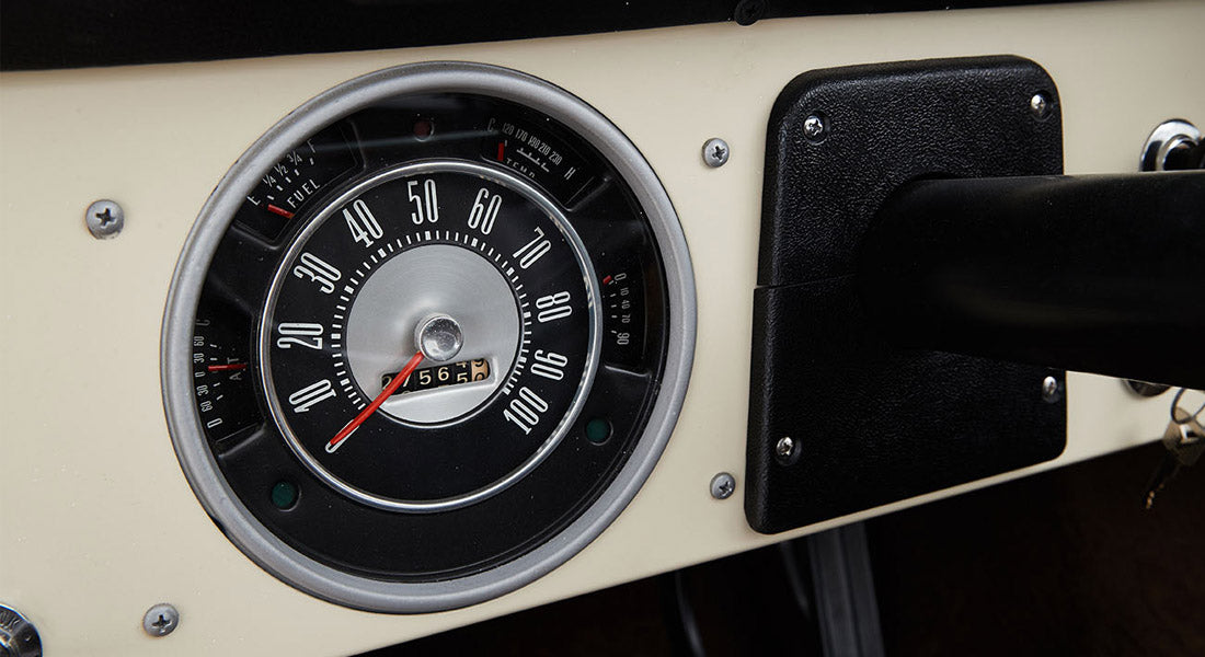 Classic Ford Bronco dashboard speedometer and fuel gauge with beige panel