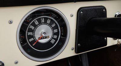 Classic Ford Bronco dashboard speedometer and fuel gauge with beige panel
