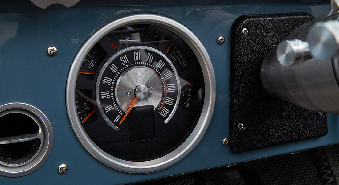 Classic Ford Bronco dashboard speedometer with fuel, battery, and RPM gauges