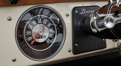 Close-up of a Classic Ford Bronco speedometer dial with odometer and fuel gauge