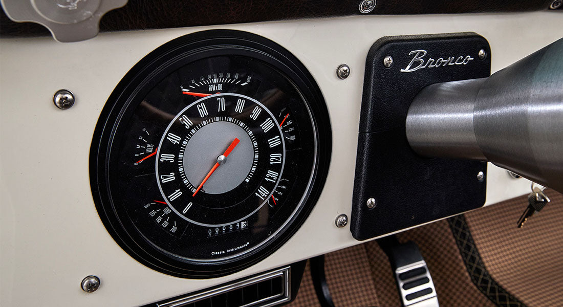 Classic Bronco dashboard speedometer and tachometer with white trim and black face