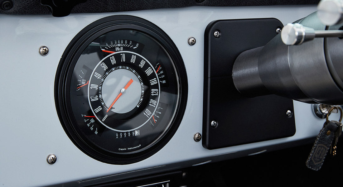 Close-up of Classic Ford Bronco round speedometer showing 0 mph