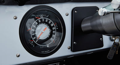Close-up of Classic Ford Bronco round speedometer showing 0 mph
