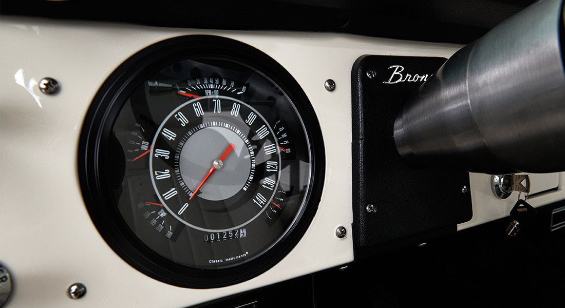 Close-up of Classic Ford Bronco speedometer showing 0 mph and odometer reading 001252