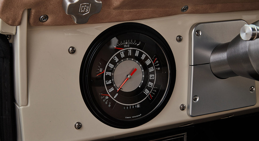 Classic Ford Bronco dashboard speedometer with vintage round gauge design