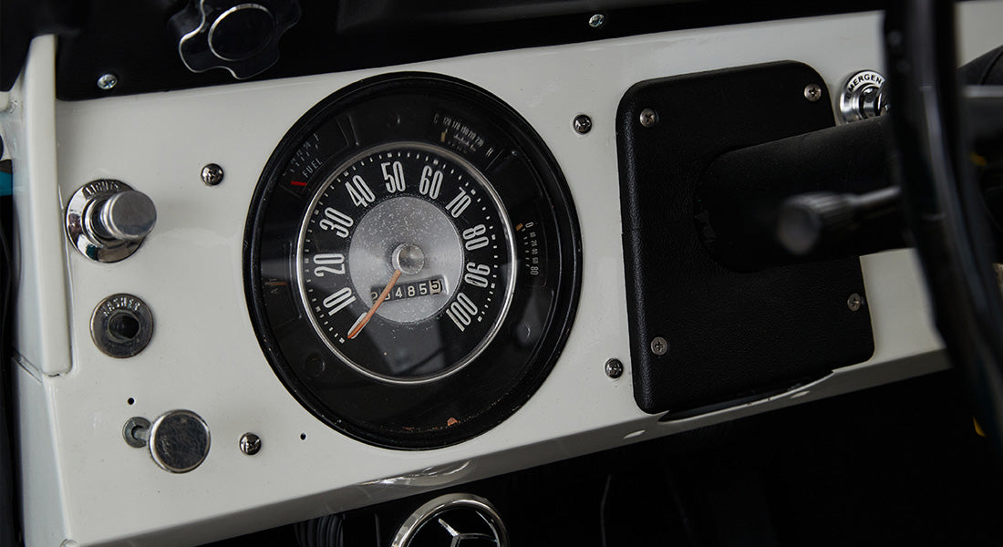 Close-up of speedometer and dashboard controls in a Classic Ford Bronco