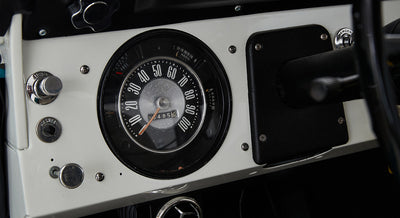 Close-up of speedometer and dashboard controls in a Classic Ford Bronco