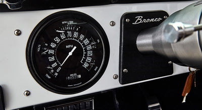Dashboard speedometer and tachometer gauges of a Classic Ford Bronco