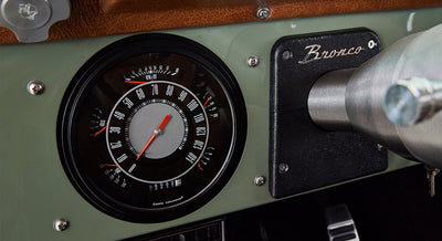 Speedometer in Classic Ford Bronco dashboard labeled Bronco with RPM and speed readings
