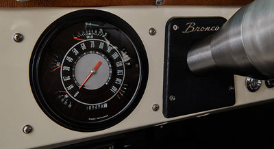 Classic Ford Bronco dashboard speedometer showing just above 20 mph