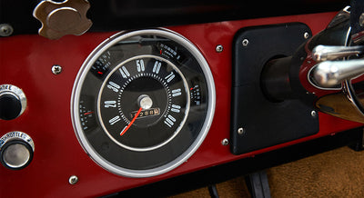 Classic Ford Bronco speedometer with odometer reading 172889 miles in red dashboard