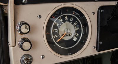 Speedometer and fuel gauge on the dashboard of a Classic Ford Bronco