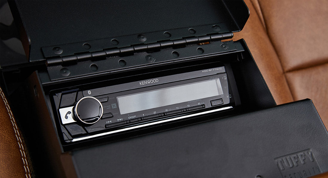 Kenwood stereo installed in the center console of Classic Ford Bronco