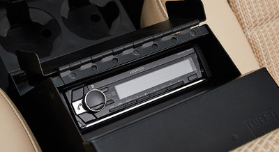 Kenwood stereo system installed inside center console of Classic Ford Bronco