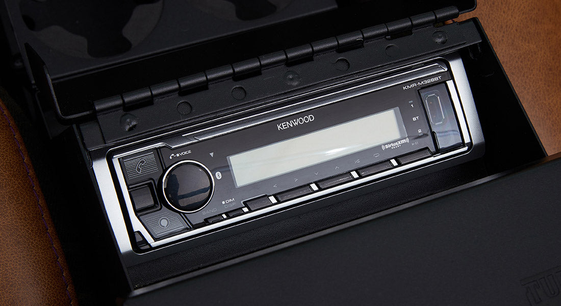 Kenwood stereo unit mounted in dashboard of Classic Ford Bronco