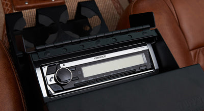 Black Kenwood stereo system installed in Classic Ford Bronco center console