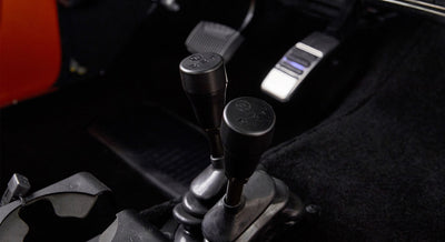 Gear levers and pedal area of a Classic Ford Bronco interior