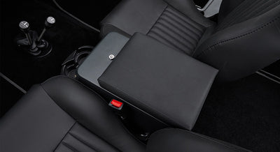 Black leather seats and center console inside a Classic Ford Bronco